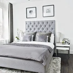 Bedroom design with light gray bed