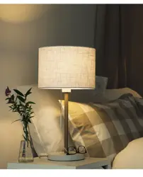 Lamps on the bedside table in the bedroom photo