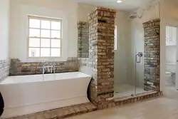 Bathroom With Bricks Photo