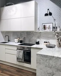 Ошхона бо countertop мармарӣ ва акс splashback