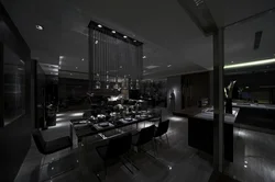 Черная кухня в интерьере гостиной