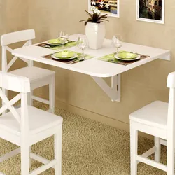 Photo of stylish tables for the kitchen