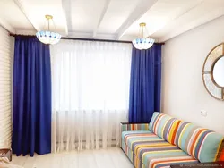 Bedroom design with blue curtains photo