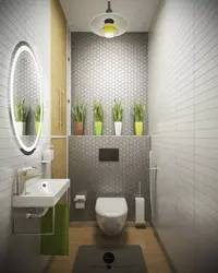 Interior of a toilet with a sink without a bathtub