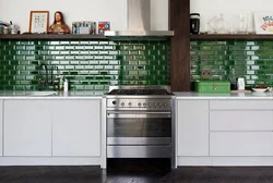 Kitchen design with green tiles