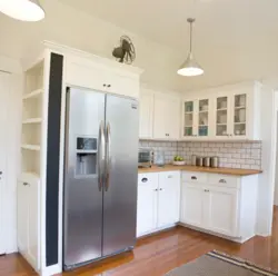 Photo of a kitchen with a large refrigerator photo