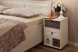 Bedside tables in the bedroom made of wood photo