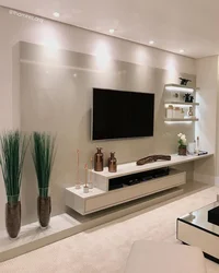 Design of a TV area in the living room in a modern style photo