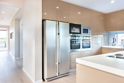 Two-door refrigerator in the interior of a modern kitchen