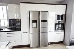 Two-door refrigerator in the interior of a modern kitchen