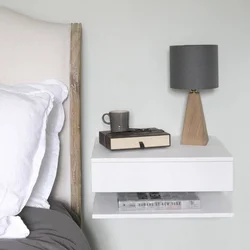 Photo of hanging bedside tables in the bedroom