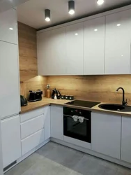 Corner gray kitchens with wood photo