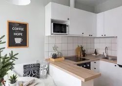 Кухня угловая с деревянной столешницей фото