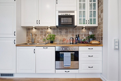 Corner kitchen with wooden countertop photo