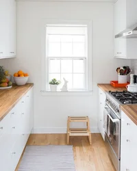 Corner kitchen with wooden countertop photo