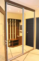 Modern mirrored wardrobes in the hallway photo