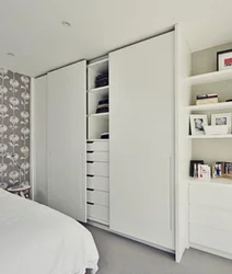 Bedroom wardrobes in a modern style in a small room photo