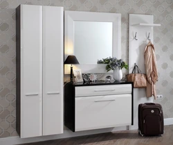 Modern chest of drawers with mirror in the hallway photo