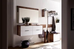 Modern chest of drawers with mirror in the hallway photo