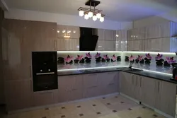 Photo Of A Modern Kitchen With Built-In Appliances