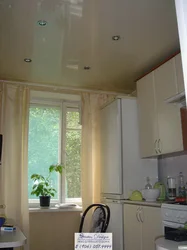 Design of a matte stretch ceiling in the kitchen photo