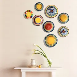 Decorative plates on the wall in the kitchen interior