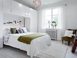 Bedroom design with white bed in modern style