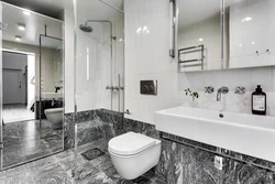 Bathtub with gray floor photo