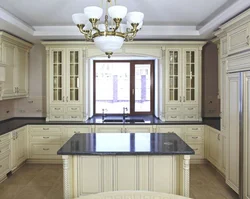 Kitchen design with a window in a classic style