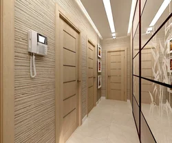 Design of a narrow corridor in an apartment of a panel house photo