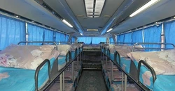 Автобус со спальными местами для пассажиров фото