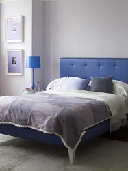 Блакітны ложак у інтэр'еры спальні фота
