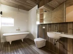 Interior Of A Bathroom In A Wooden House