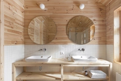 Interior of a bathroom in a wooden house