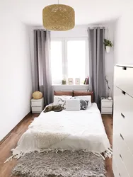 Interior small bedroom with one window photo