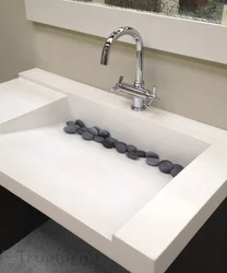 Bath sinks built into the countertop photo