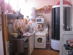 Apartments with a toilet in the kitchen photo