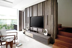 Дизайн стены с телевизором в гостиной с рейками