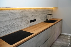 Photo Of A Kitchen With An Apron And A Wood-Look Countertop