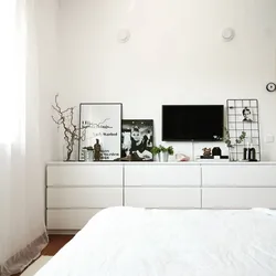 TV On The Chest Of Drawers In The Bedroom Interior