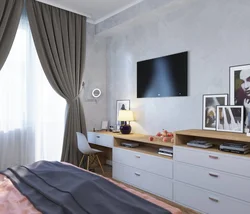 TV On The Chest Of Drawers In The Bedroom Interior