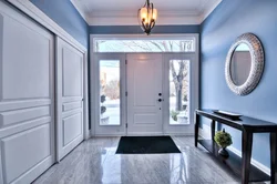 Hallway in blue color in the interior