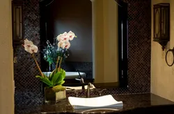 Artificial flowers in the bathroom interior