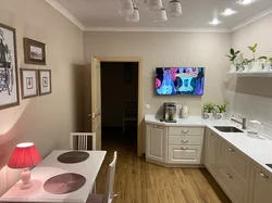 Corner kitchen with TV photo in modern style