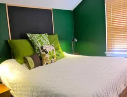 Green bed in bedroom interior photo design