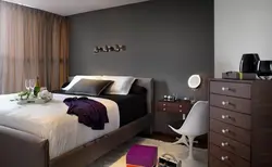 Dark gray walls in the bedroom interior