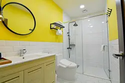 Yellow and white bathroom design