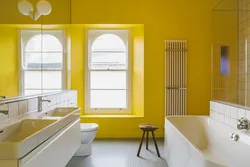Yellow and white bathroom design