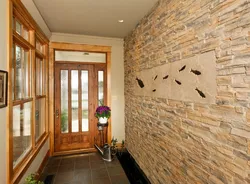 Hallway design with stone and wallpaper