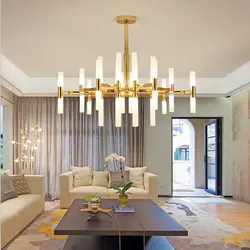 Chandelier in the kitchen living room in a modern style in the interior